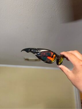 Oakley Black Frame with Red-Orange Mirrored Lenses